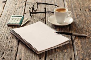 Notepad and Pen on Table